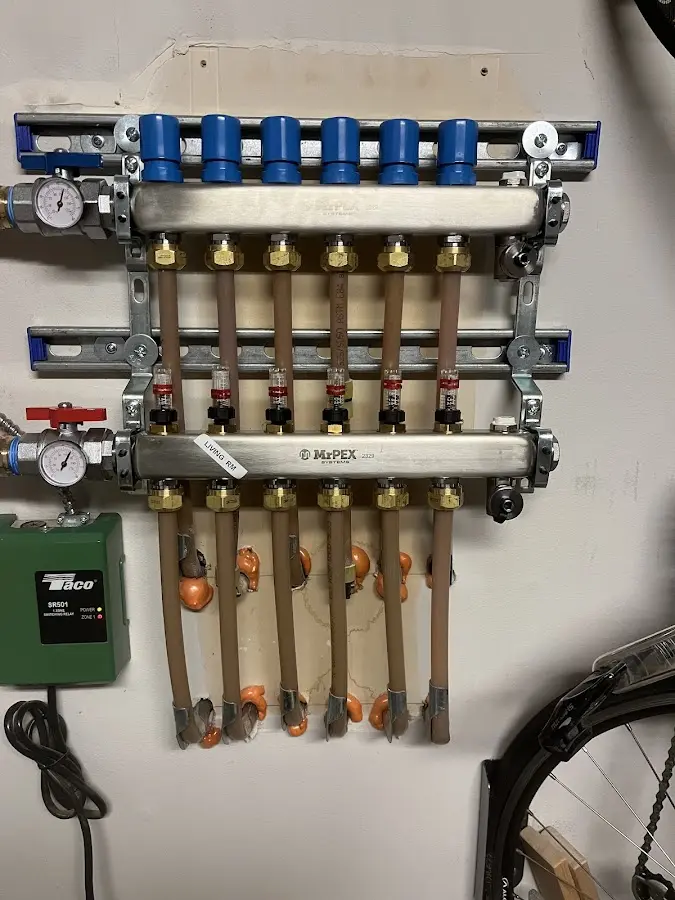 Plumber performing Gas Line Installation at a residential property in Leoni